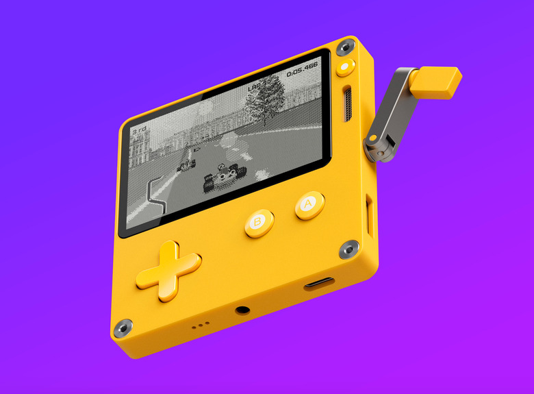 The console on a purple background displaying a racing game. 