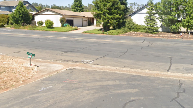 a sidebyside of the stop sign and street sign in Cameron Park, CA